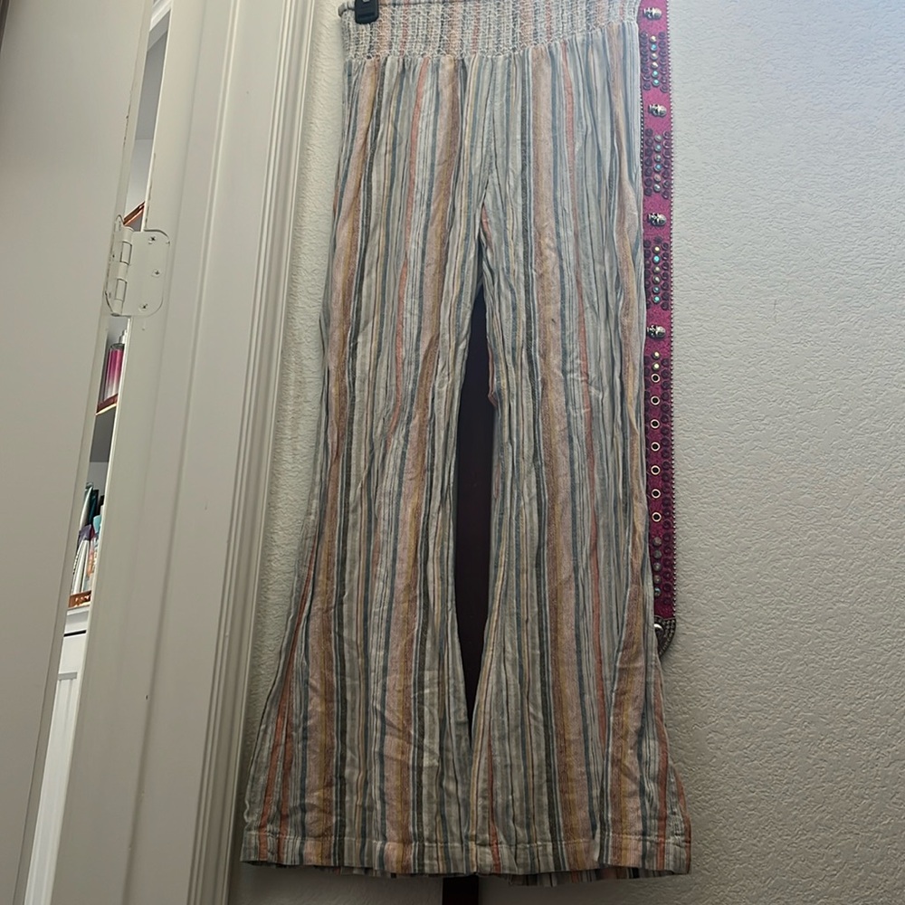 Medium fits like a small. REALLY stretchy. Brand Indigo Reign. Multi colored.